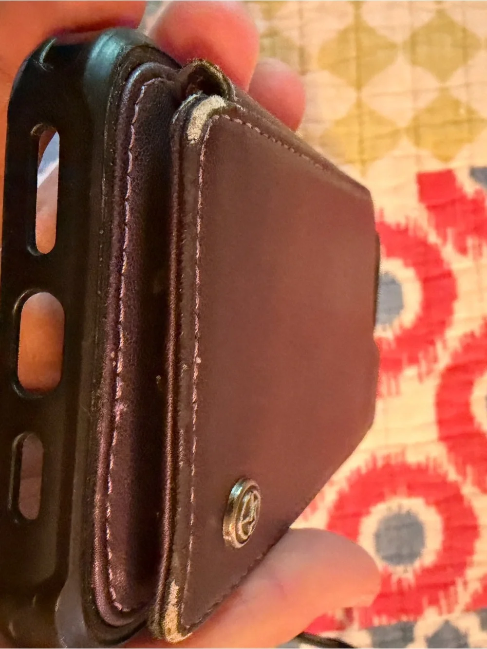 Set of 2 iPhone 16 Pro Max phone cases: one purple Wallet, one black and clear